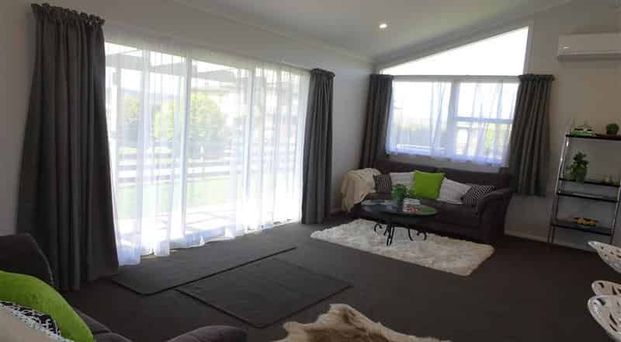 Warm & Welcoming Three-Bedroom Home with Double Garage - Photo 1