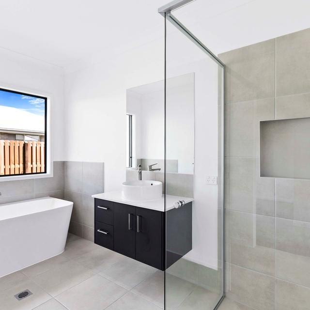 BRAND NEW HOME IN BURRUM HEADS - Photo 1