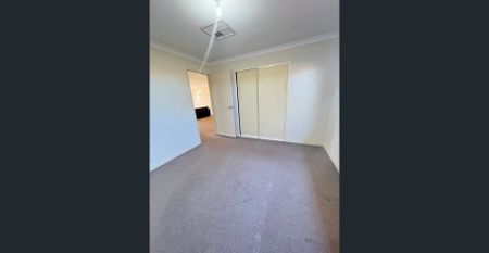 Tidy Unit in a Gated complex with sparkling pool! - Photo 4