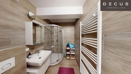 CHARMANTE DG-WOHNUNG MIT TERRASSE | SAUNA & GARAGE | WESTSEITIGE INNENHOFLAGE | AB SOFORT - Photo 2
