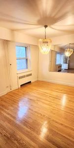 ** Because You Deserve HUGE 2bed 2bath, Concrete Building, CDN, UDM ** - Photo 4