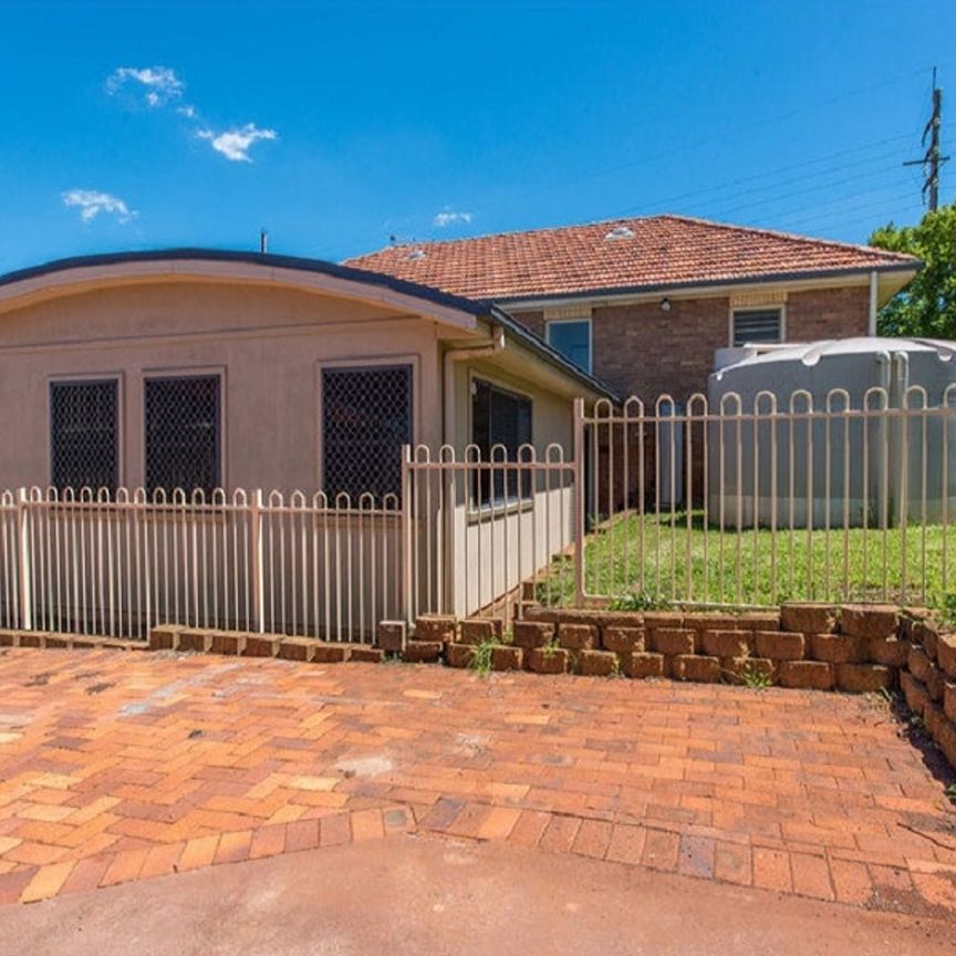 The Whole Package! Spacious 5-Bedroom Home + Sheds Galore! - Photo 1