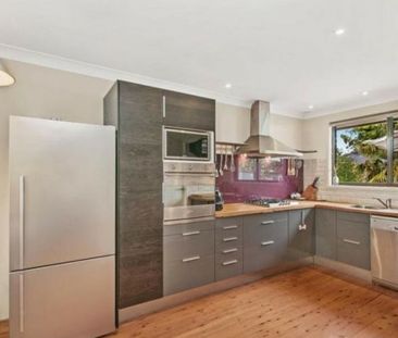 Neat Three-Bedroom Home in Convenient Location - Photo 4