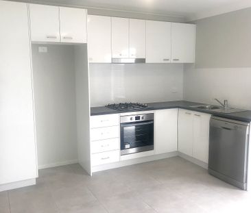 MODERN LOW MAINTENANCE UNIT - Photo 2