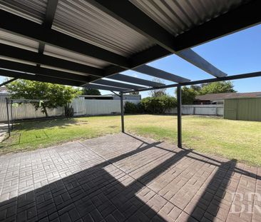 Refreshed Family Home with Spacious Yard and Powered Shed - Photo 6
