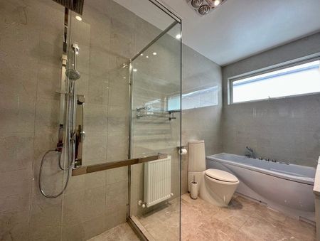 ARCHITECTURALLY DESIGNED TOWNHOUSE IN THE MCKINNON SCHOOL ZONE - Photo 4