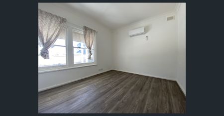 Renovated Family Home with Premium Security & Space - Photo 4