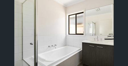 Spacious 4-Bedroom Home in Prime Location - Photo 5