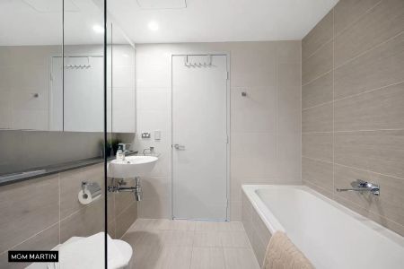 MGM MARTIN – AIR CONDITIONED FULLY FURNISHED SPLIT-LEVEL TWO BEDROOM APARTMENT - Photo 5