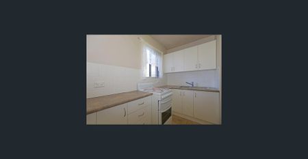 Ground Floor Unit with Carport - Photo 2