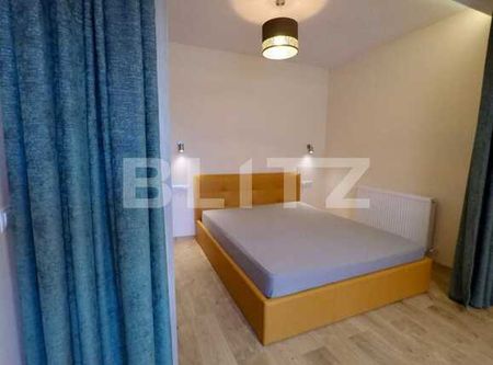 Apartament cu nisa de dormit si living lux, garaj, zona Sub Cetate! - Photo 4