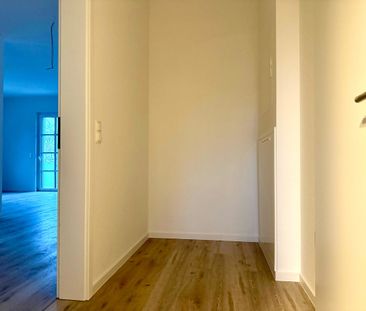 Neubau im Zentrum: 3-Zimmer-Obergeschosswohnung mit Südwest-Balkon! - Foto 1