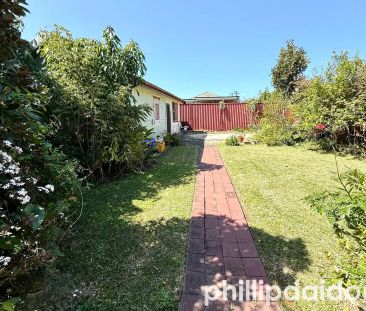 “Spacious 4-Bedroom Brick House” - Photo 1