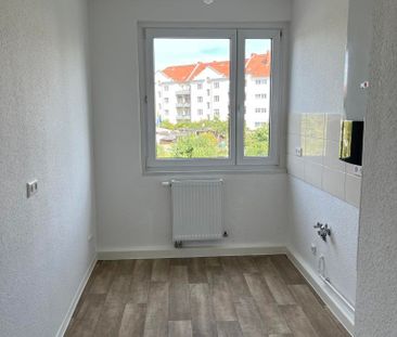 Gute Anbindung: 3-Zimmer-Wohnung mit Balkon am Ring - Photo 1