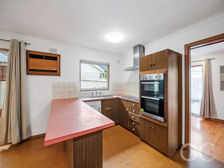 Open the Door to Family-Sized Comfort in a Quiet Netley Haven - Photo 2