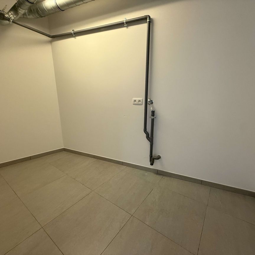 Nieuwbouwappartement met 3 slaapkamers, groot terras en autostaanplaats te huur in centrum Leuven - Photo 1