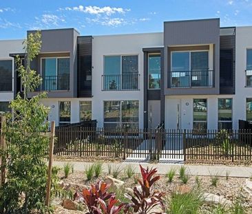 Luxurious 2 bedroom Townhome on the Park at Sola North Lakes - Photo 1