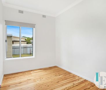 Freshly Renovated 2-Bedroom Home with Modern Finishes - Photo 5