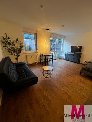 Sehr hübsche 1 Zimmer-Wohnung mit offener Thekenküche - Foto 1