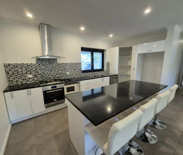 4 BEDROOM, 2 BATHROOM HOUSE IN EASTSIDE WITH LARGE OUTDOOR ENTERTAI... - Photo 1