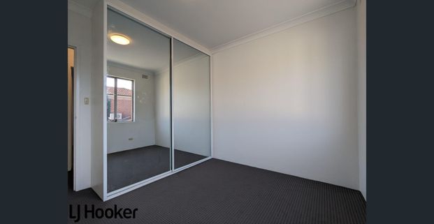 Spacious 3-Bedroom Unit in Quiet Street with Lock up Garage and Built-ins - Photo 1