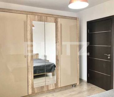 Apartament 3 camere, 58 de mp, modern, loc de parcare, zona Centrala - Fotografie 2