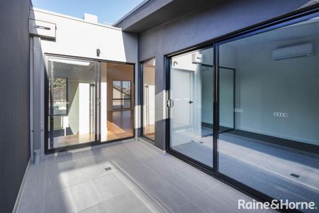 NEWLY BUILT! ARCHITECTURAL TOWNHOUSE IN BRUNSWICK AWAITS YOU - Photo 5