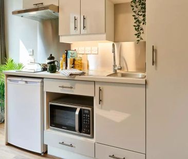 Penthouse Plus Studio - Photo 6
