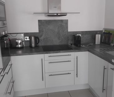 Appartement de type F2, centre ville de Lamorlaye, dans résidence s... - Photo 1