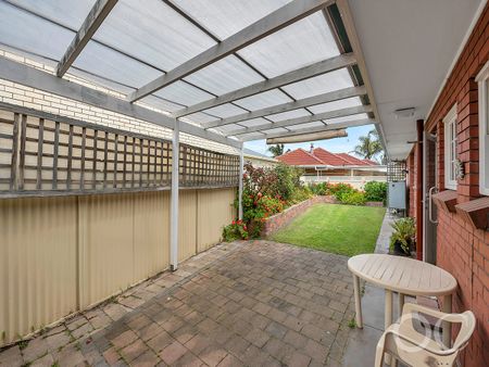 Open the Door to Classic Comfort Just Steps from the Coast - Photo 5