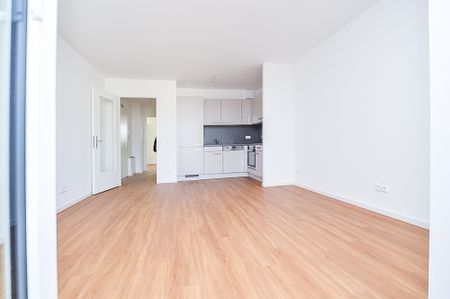 KOMFORTABEL WOHNEN - MIT AUFZUG, BALKON, FUSSBODENHEIZUNG UND EINBAUKÜCHE - Photo 2