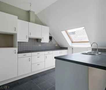 Centraal gelegen 2 slpk. appt. met gar. en terras. Vrij vanaf 15/03... - Photo 6