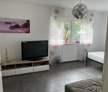 Schöne Wohnung mit Dachterrasse - Photo 1