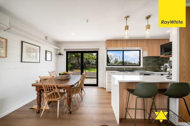 Elevated Coastal Living with Panoramic Harbour Views - Photo 1