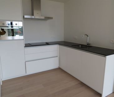 Prachtig nieuwbouwappartement met één slaapkamer, terras en parking! - Photo 4