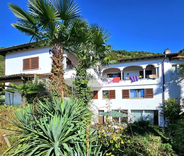 Wohnung in Villa: Erdgeschoss mit Kamin, Sitzplatz und Seeblick - Foto 6