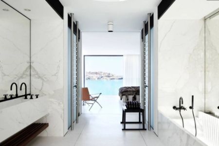 Architecturally Stunning home with direct water views from every level! - Photo 5