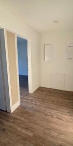 Moderne 2-Zimmer-Terrassenwohnung mit Einbauküche, Fußbodenheizung und Tiefgaragenstellplatz - Photo 4