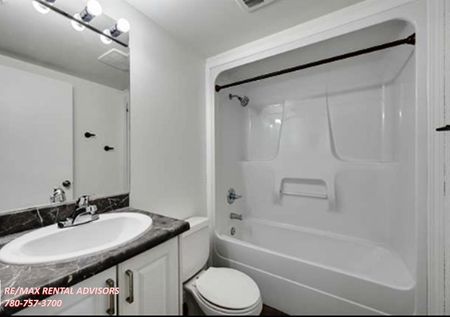 GREAT 2 BED, 1 BATH APARTMENT WITH OUTDOOR PARKING STALL IN THE COMMUNITY OF PARKDALE - Photo 2