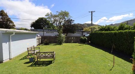 Situated in a highly sought after area, welcome to 66 Rata Street! - Photo 2