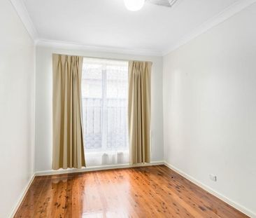 FRESHLY PAINTED 4 BEDROOM HOME IN IDEAL LOCATION - Photo 5