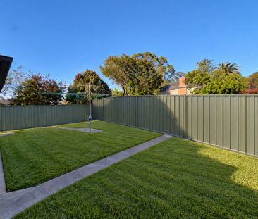 Freshly Updated Three Bedroom Home with Plenty to Offer - Photo 1