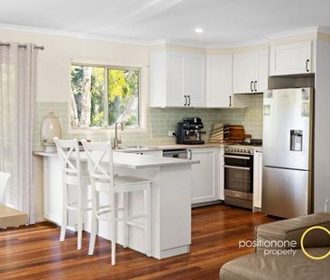 Renovated Family home backing onto peaceful bushlands! - Photo 5