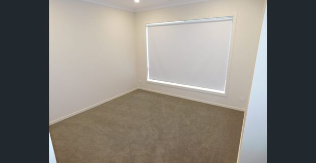 FOUR BEDROOM FAMILY HOME WITH LANDSCAPED GARDENS - Photo 1