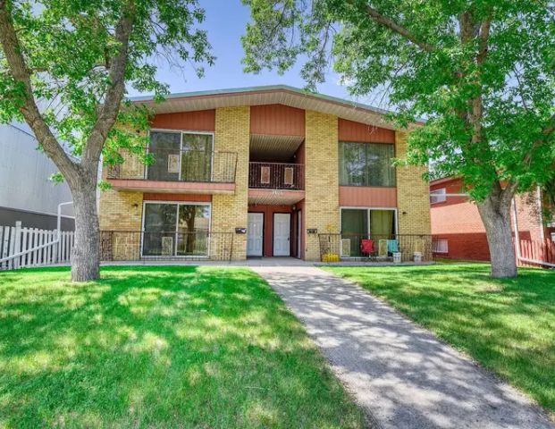 Crescent Heights: Main Floor in Fourplex | 3403 Centre Street Northwest, Calgary - Photo 1