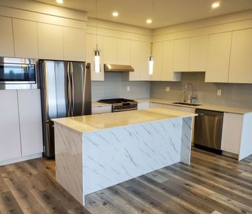 Bright, Open Concept Upper! - Photo 2