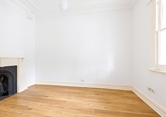 Classic Two Bedroom Semi with Rear Lane Parking - Photo 1