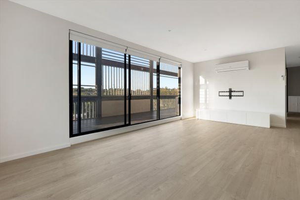 Ultra-modern north-facing oasis with Auburn Village convenience - Photo 1
