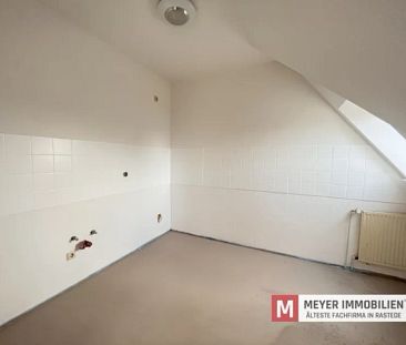 Zentrale Dachgeschosswohnung mit Fahrstuhl im Ortskern von Rastede! - Photo 6