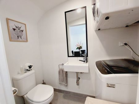 Stylish 2-Bedroom Home with Modern Comforts & Private Outdoor Spaces - Photo 5